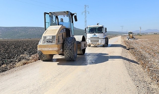 Menderes Belediyesi, İzmir Büyükşehir Belediyesi'nin destekleri ile mahallelerde üretim yolları yapıyor.